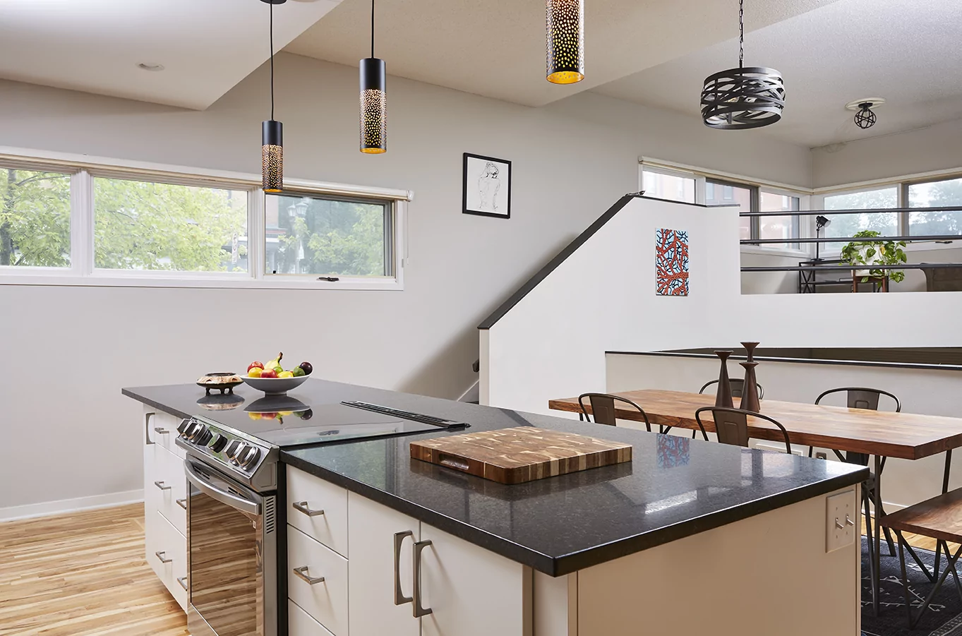 The kitchen island of a modern home with a split-level design